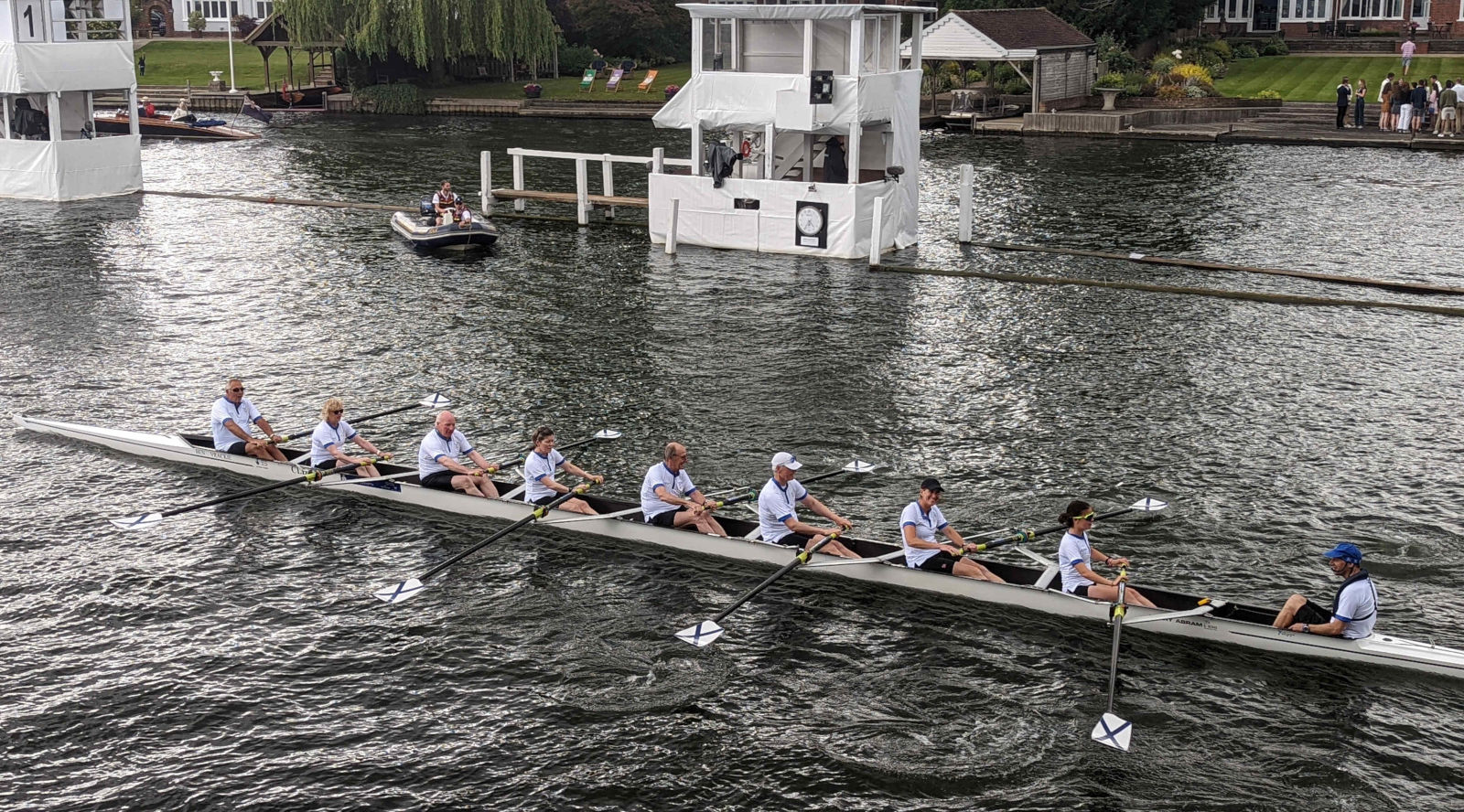 St Andrew Boat Club crew rowing on the Henley course